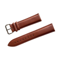 Tan top-grain leather watch band, buckle detail close-up