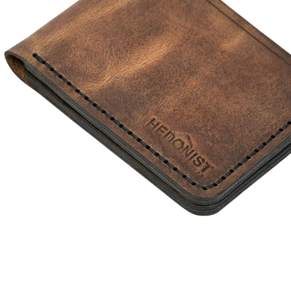 Handmade tan pull-up leather bifold wallet, interior card slots detail