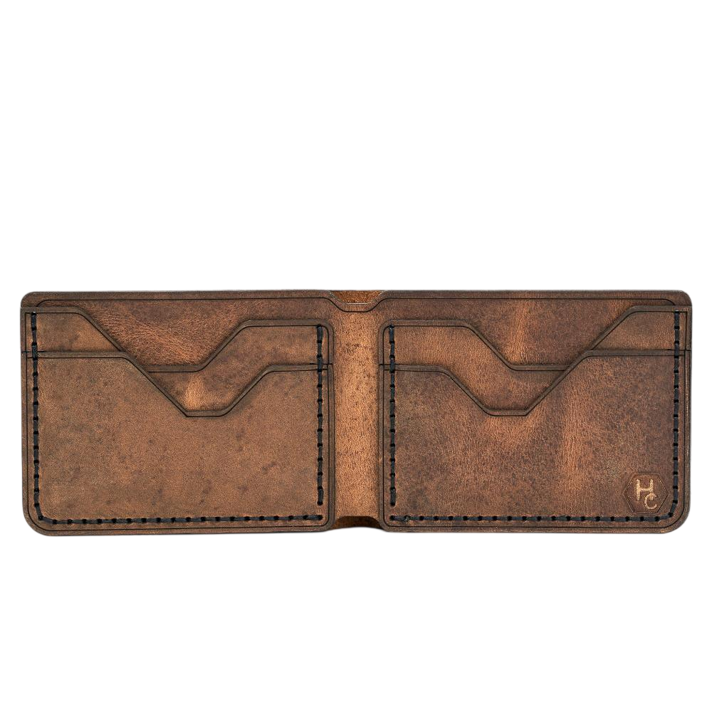 Handmade tan pull-up leather bifold wallet, 4 card slots, open showing cards