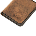 Handmade tan pull-up leather bifold wallet with ID slot, by Hedonist Chicago