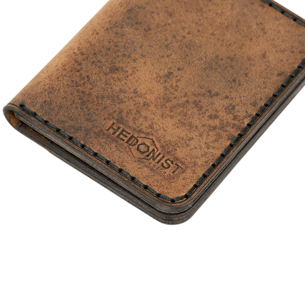 Handmade tan pull-up leather bifold wallet with ID slot, by Hedonist Chicago