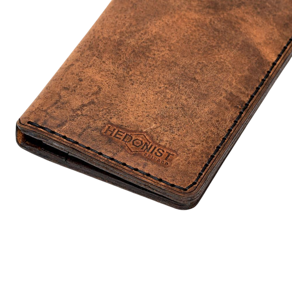 Handmade tan pull-up leather card holder, 8 card slots fanned out view