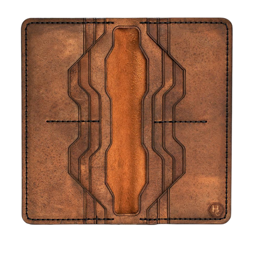 Handmade tan pull-up leather card holder, 12 card slots, open showing cards