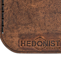 Hedonist Chicago tan key chain in tan, slim profile, full grain leather, flat lay view