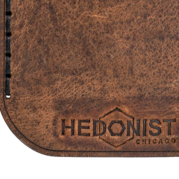 Hedonist Chicago tan key chain in tan, slim profile, full grain leather, flat lay view
