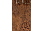 Hedonist Chicago tan key holder in tan, slim profile, full grain leather, flat lay view