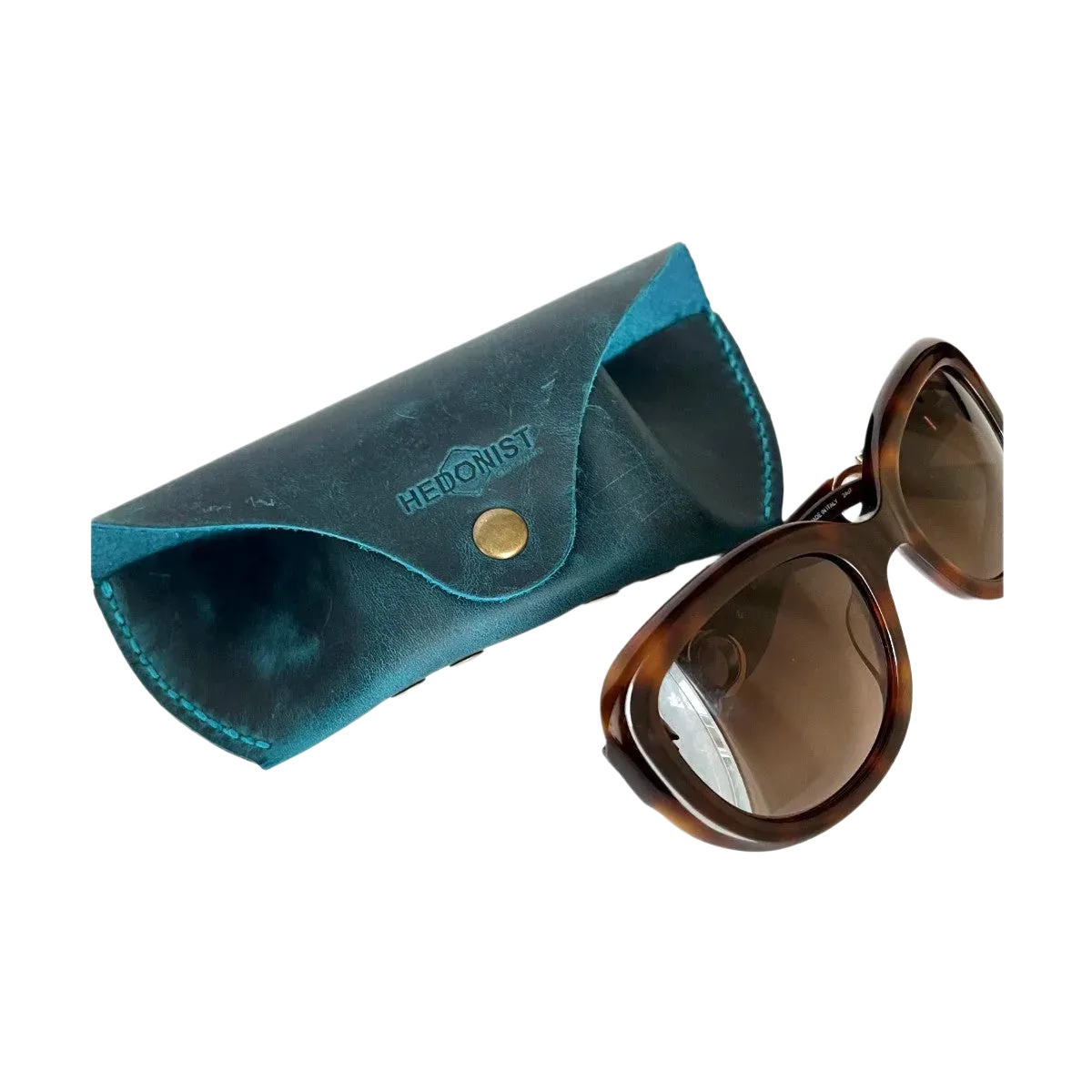 Soft Leather Eye Glasses Case in Teal with tortoiseshell sunglasses beside it