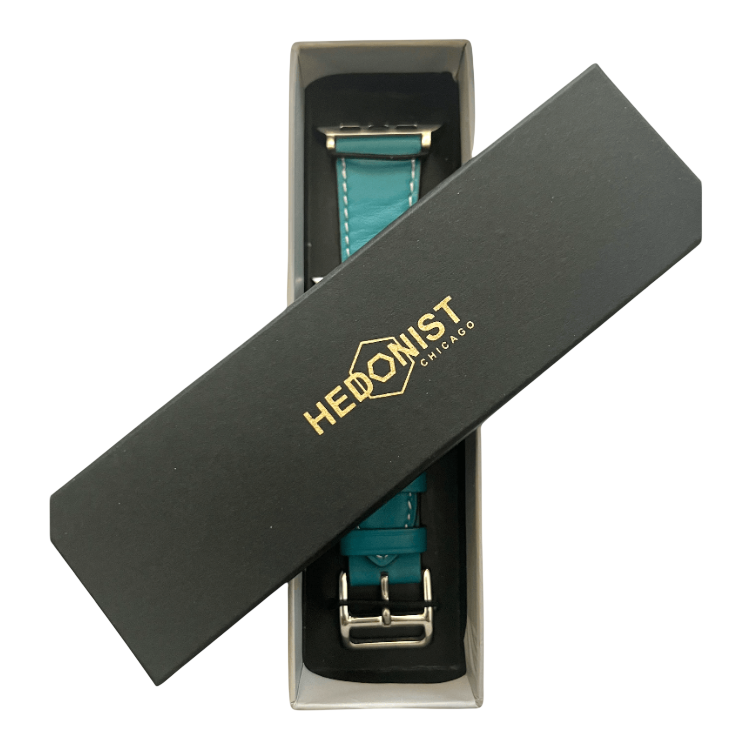 Turquoise leather Apple Watch band, presented in gift box