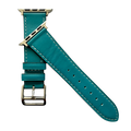 Turquoise leather Apple Watch band, texture and buckle detail close-up
