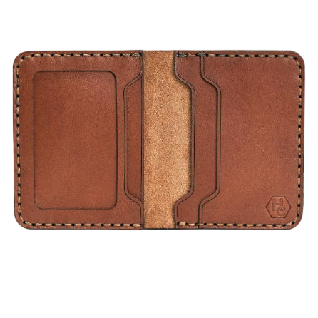 Handmade whisky leather bifold wallet with ID slot, open showing cards