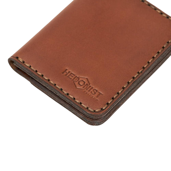 Handmade whisky leather bifold wallet with ID slot, by Hedonist Chicago