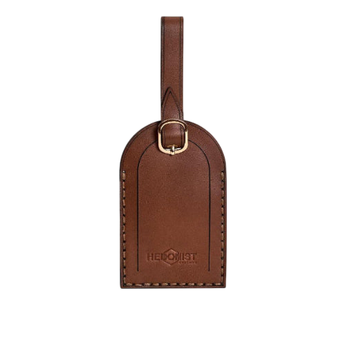 Hedonist Chicago whisky luggage tag in whisky, with strap, full grain leather, product view