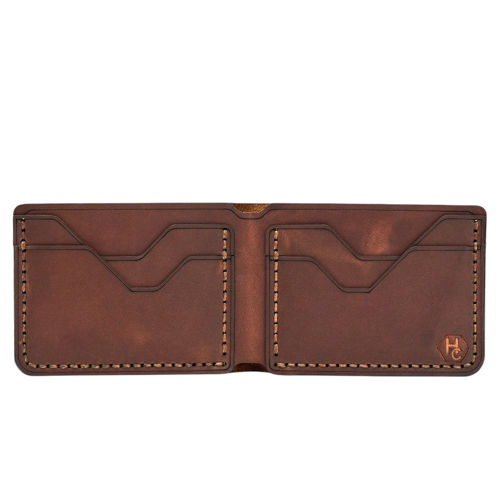 Handmade whisky pull-up leather bifold wallet, 4 card slots, open showing cards