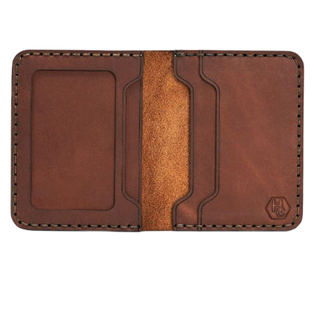 Handmade whisky pull-up leather bifold wallet with ID slot, open showing cards