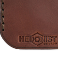 Hedonist Chicago whisky pull-up key chain in whisky, slim profile, full grain leather, flat lay view