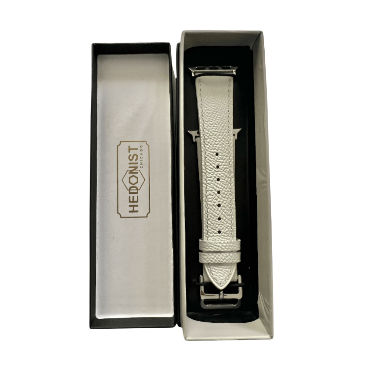 White leather Apple Watch band, presented in gift box