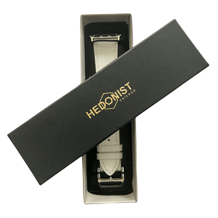 White leather Apple Watch band, packaging close-up