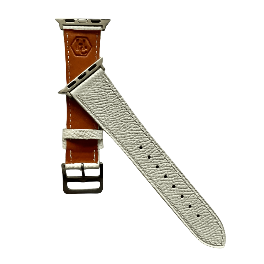 White leather Apple Watch band, texture and buckle detail close-up