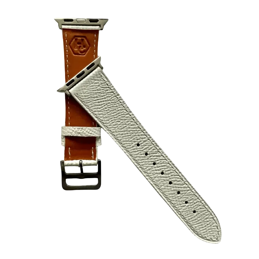 White leather Apple Watch band, texture and buckle detail close-up