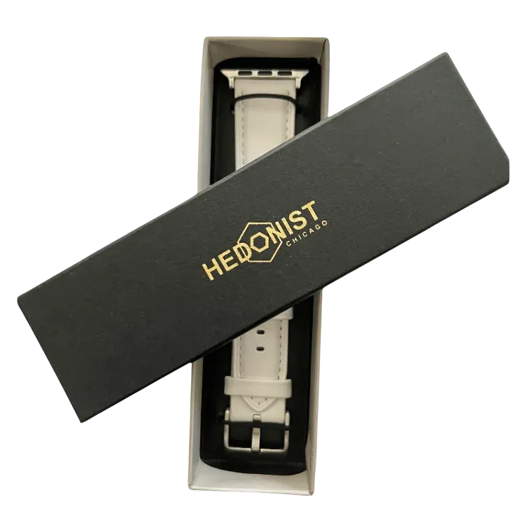 White padded leather Apple Watch band, presented in gift box