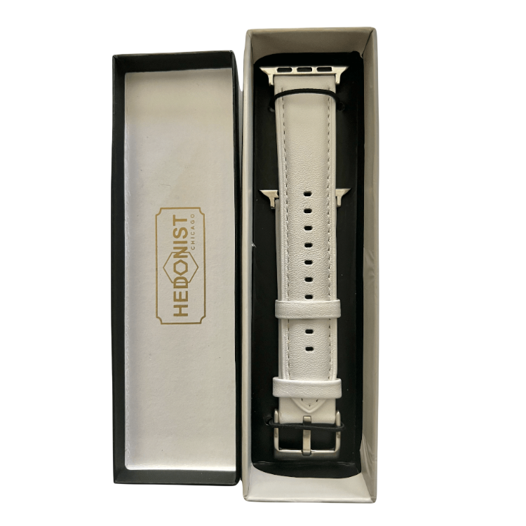 White padded leather Apple Watch band, packaging close-up