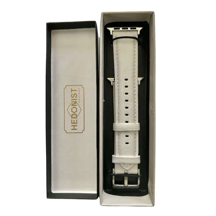 White padded leather Apple Watch band, packaging close-up