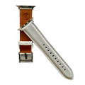 White padded leather Apple Watch band, texture and buckle detail close-up