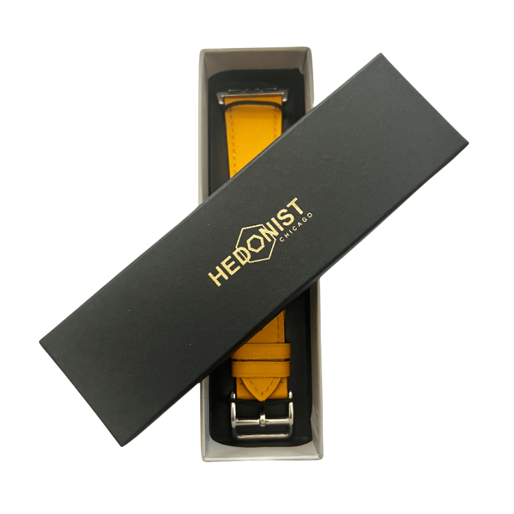 Yellow leather Apple Watch band, packaging close-up