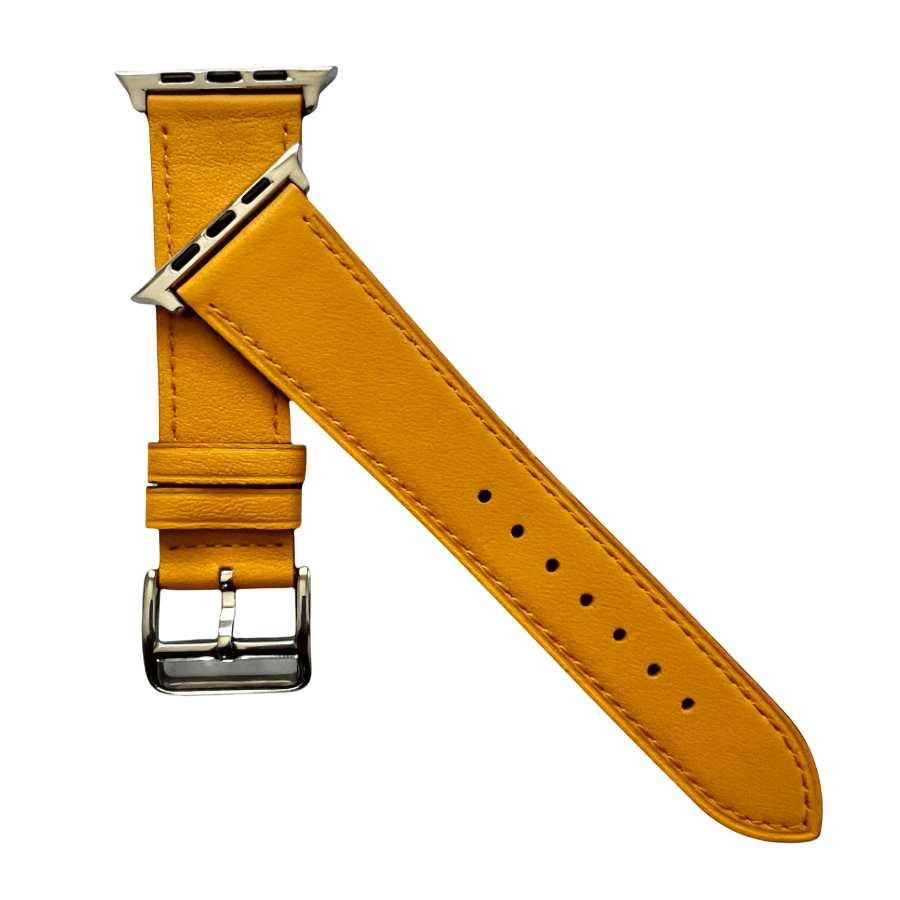 Yellow leather Apple Watch band, texture and buckle detail close-up