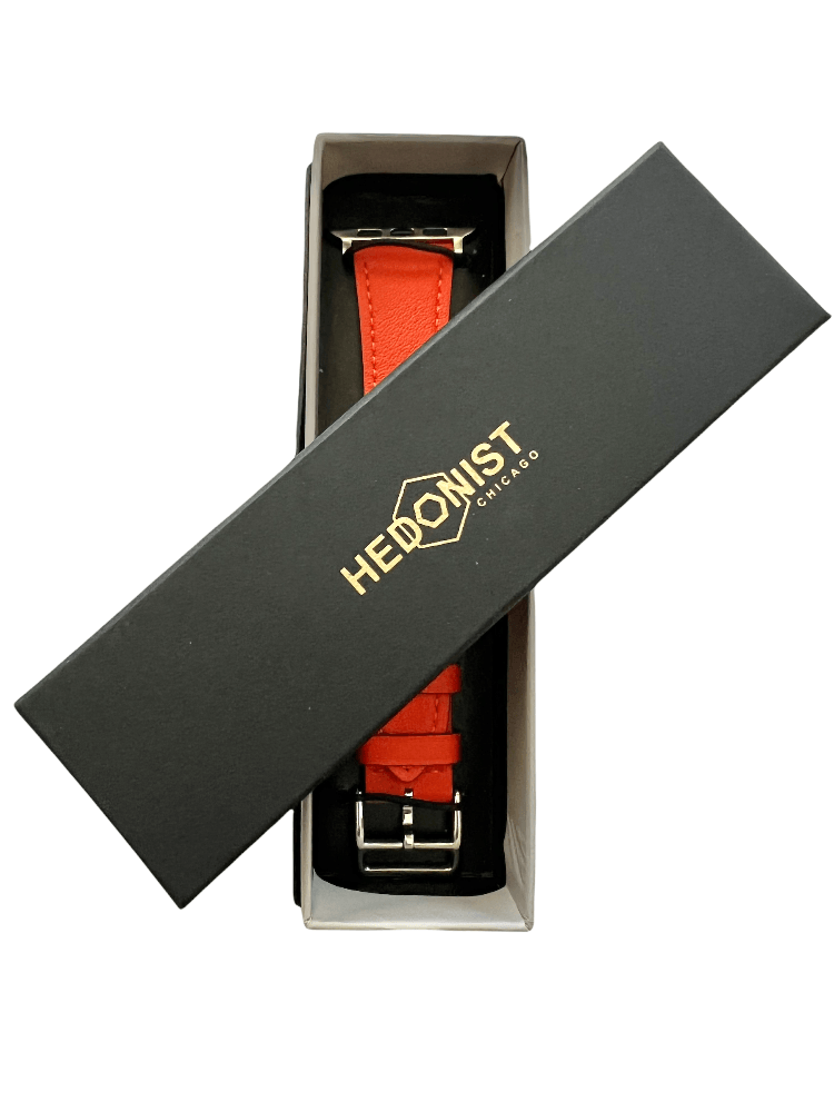 Cold orange Apple Watch band packaged in Hedonist Chicago gift box