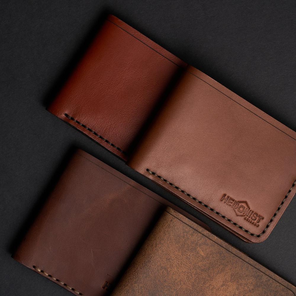 Handmade tan pull-up leather bifold wallet, 6 card slots, full display view