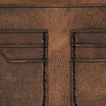 Handmade tan pull-up leather bifold wallet, close-up of leather texture and stitching
