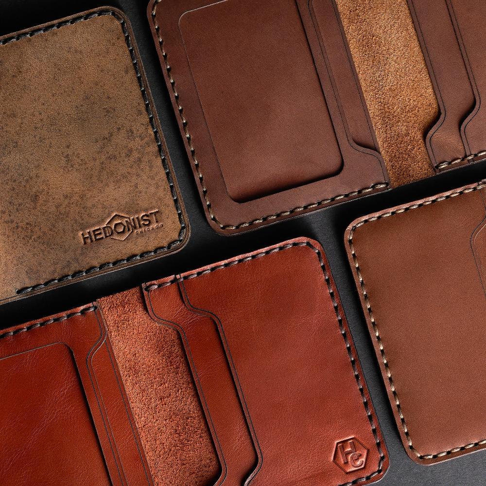 Handmade tan pull-up leather card holder, 8 card slots, full display view