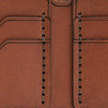 Handmade whisky leather bifold wallet, close-up of leather texture and stitching