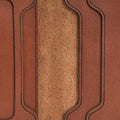 Handmade whisky leather bifold wallet, close-up of leather texture and stitching
